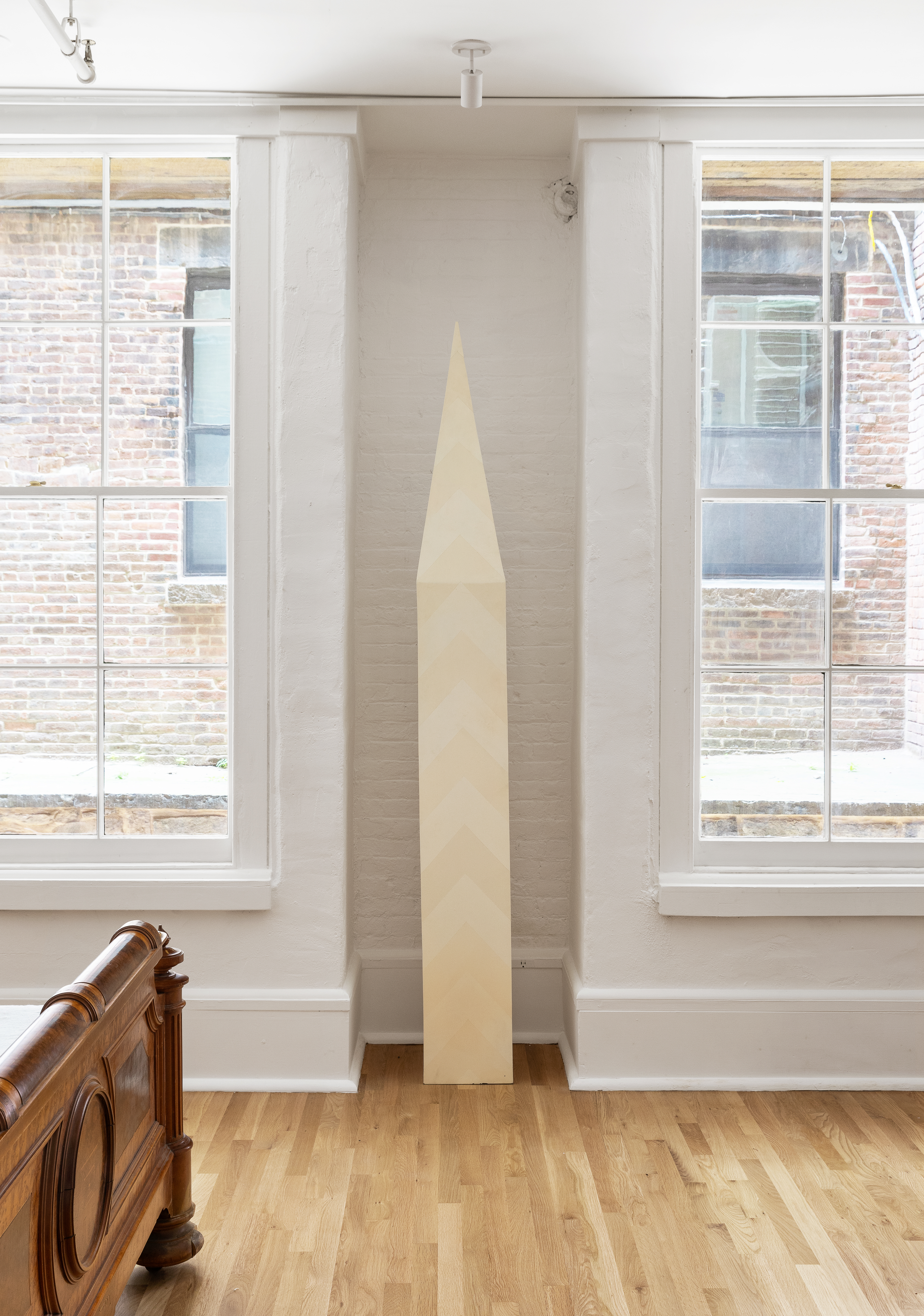 144 Franklin Street, Unit B Manhattan, NY 10013 - Photo 11 of 14 a view of empty room with wooden floor and fan
