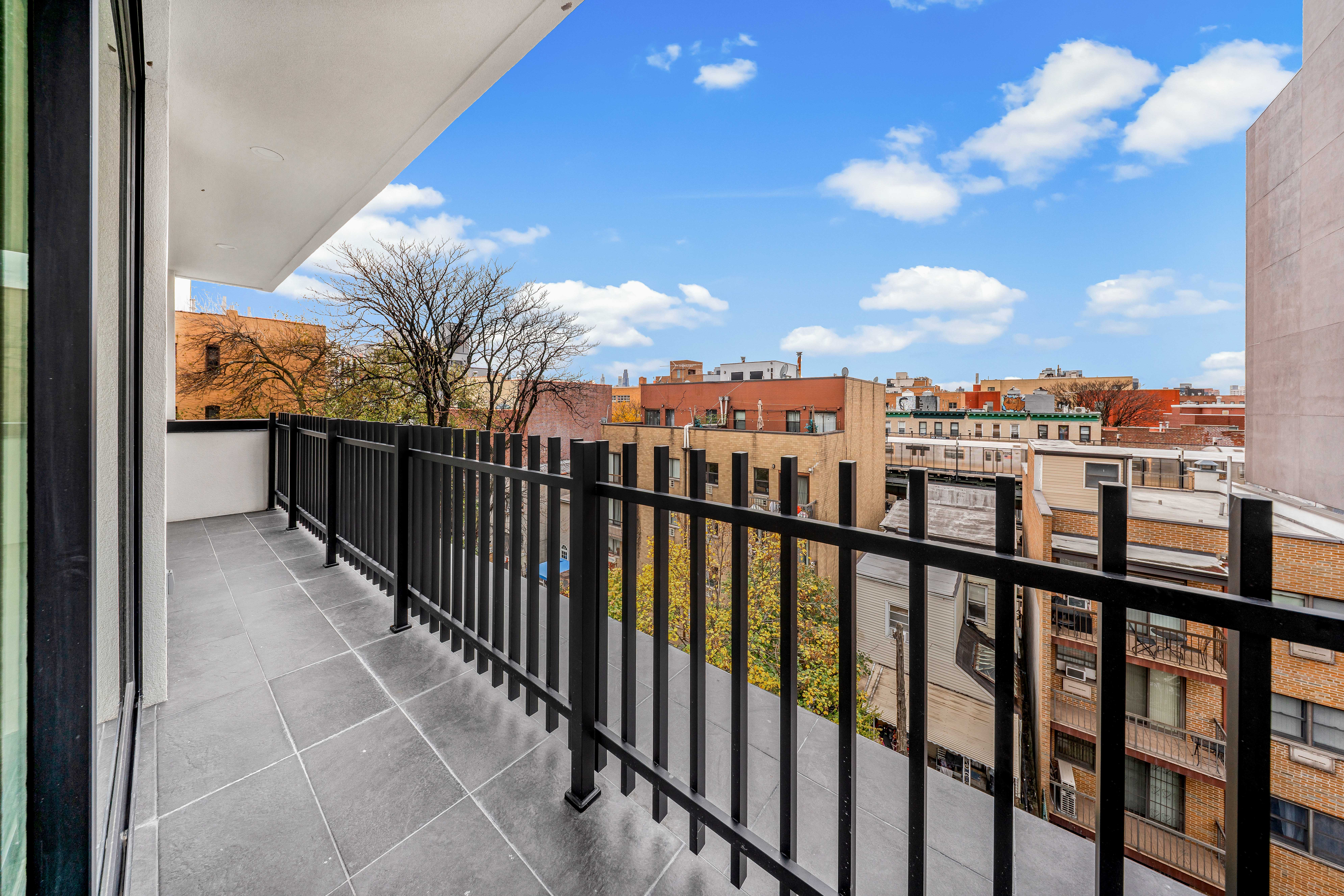 30-24 32nd Street, Unit 4A Queens, NY 11102 - Photo 19 of 22 a view of city from balcony