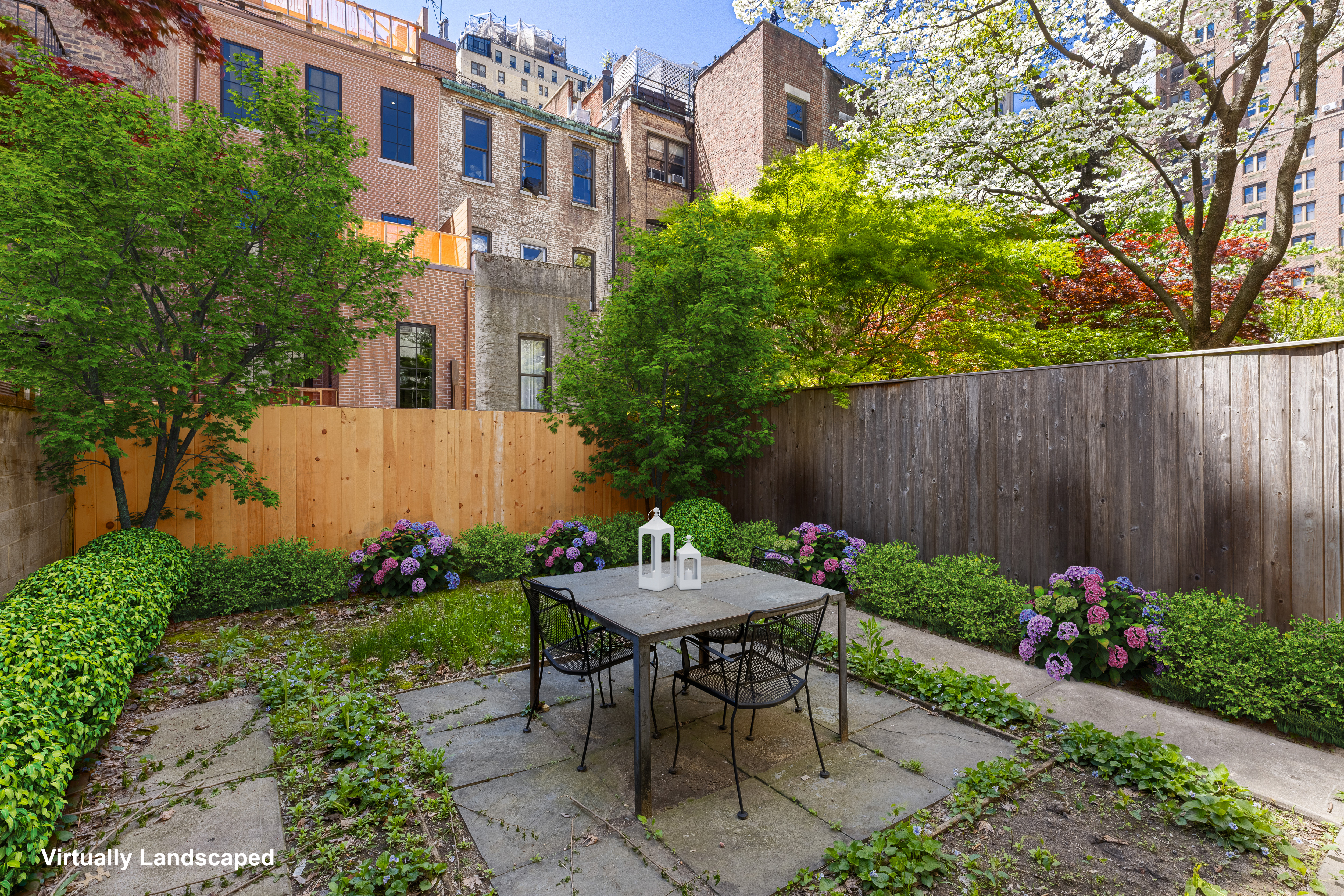a view of a patio with table and chairs and potted plants