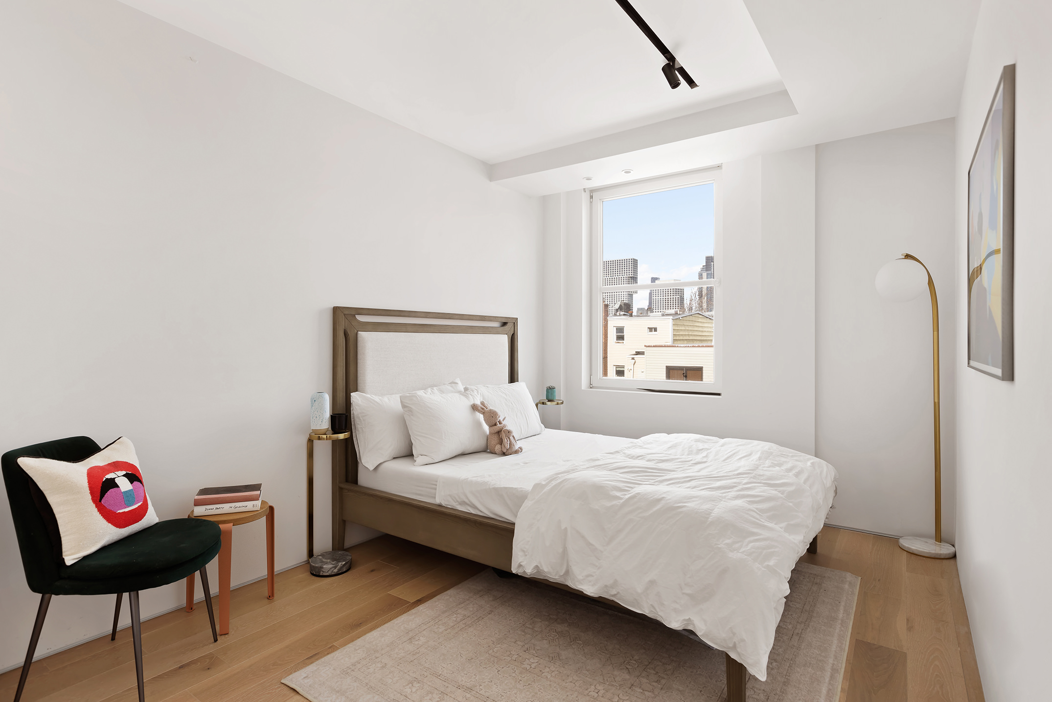 111 Noble Street, Unit 2 Brooklyn, NY 11222 - Photo 8 of 13 a bedroom with a bed and a closet