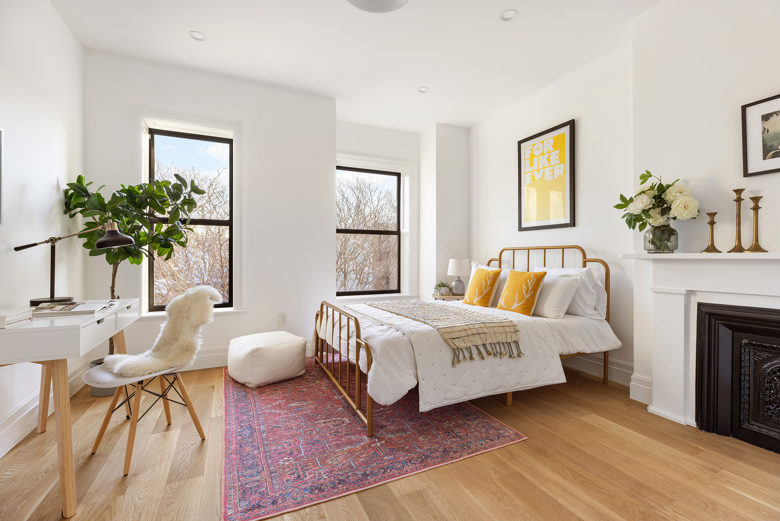 347 A Quincy Street Brooklyn, NY 11216 - Photo 8 of 15 a spacious bedroom with a bed and a potted plant
