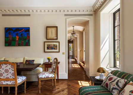 a living room with furniture and a window