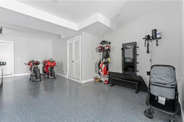 a bedroom with furniture and a potted plant
