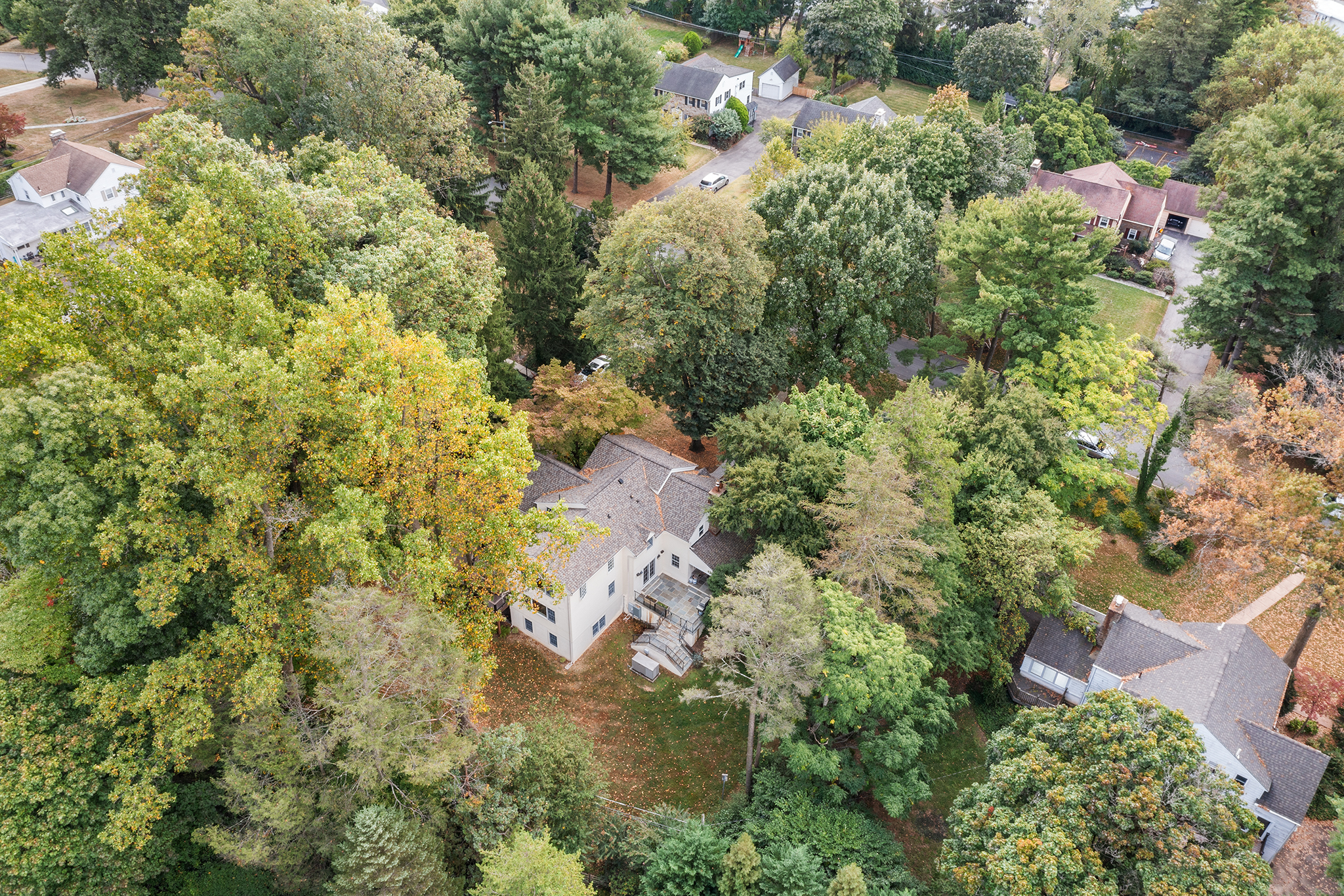 718 Arlington Road Narberth, PA 19072 - Photo 45 of 47 an aerial view of residential house with outdoor space and trees all around