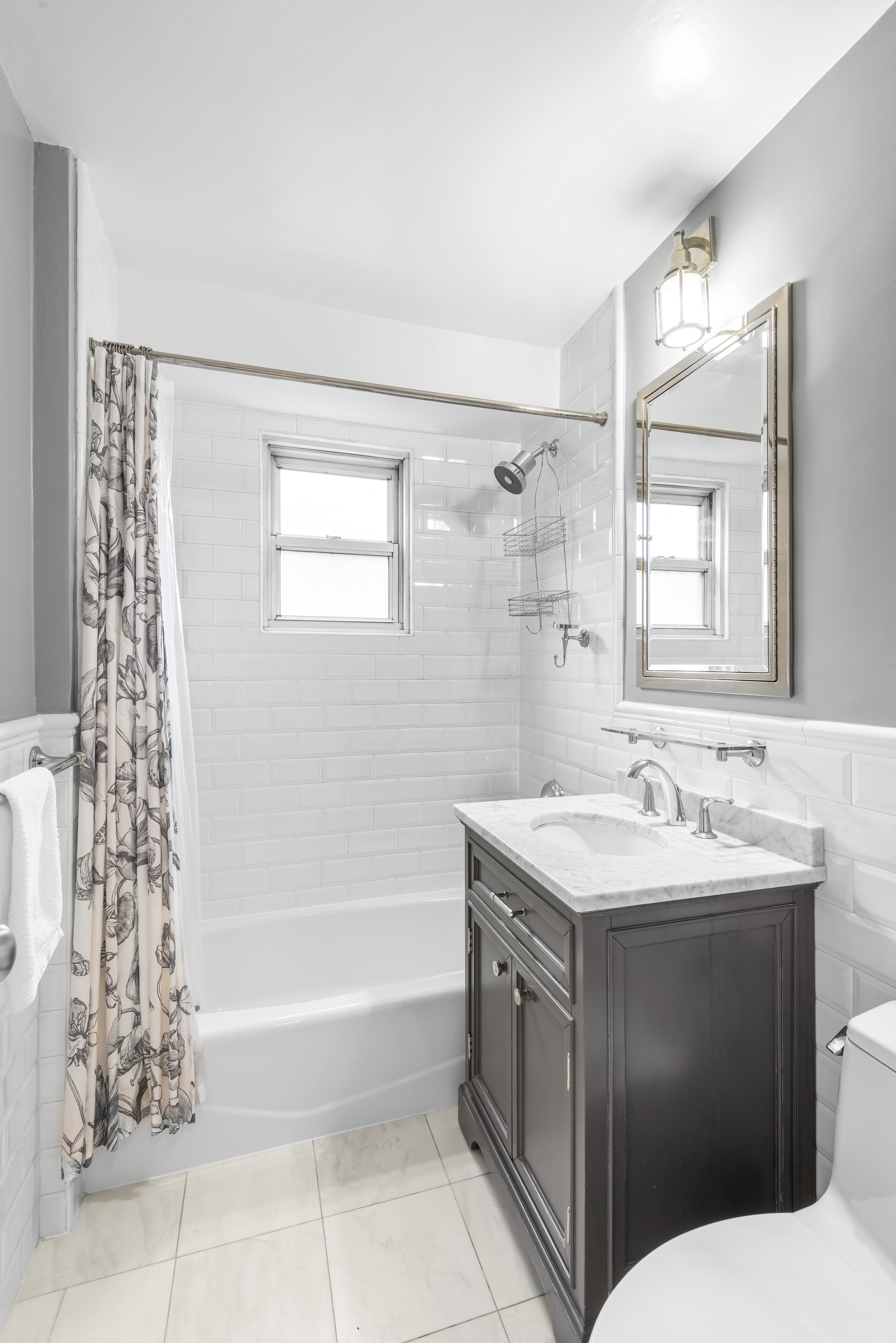 2 Charlton Street, Unit 5A Manhattan, NY 10014 - Photo 10 of 12 a bathroom with a sink toilet and shower