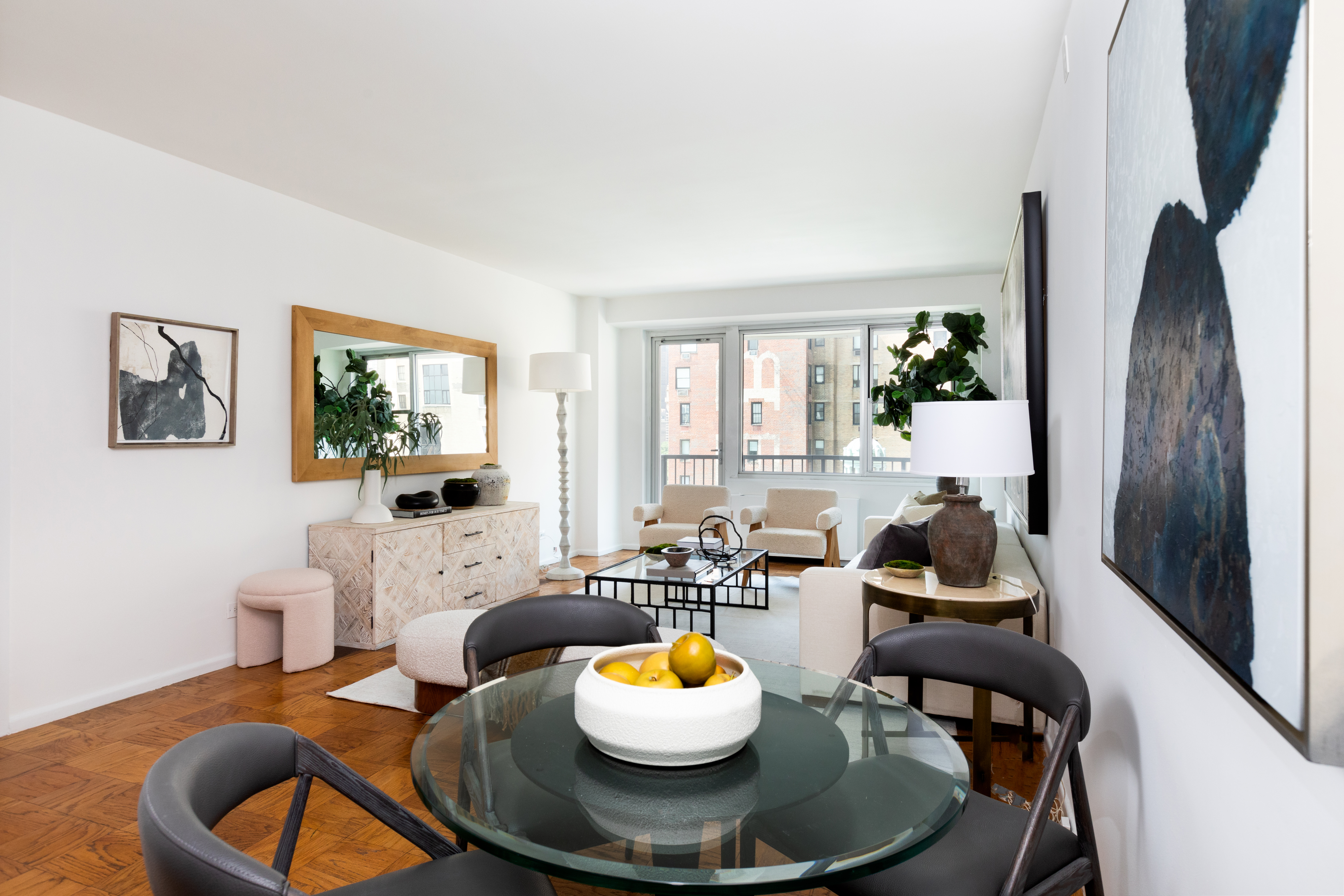 80 Central Park West, Unit 12C Manhattan, NY 10023 - Photo 6 of 27 a living room with furniture and a fireplace