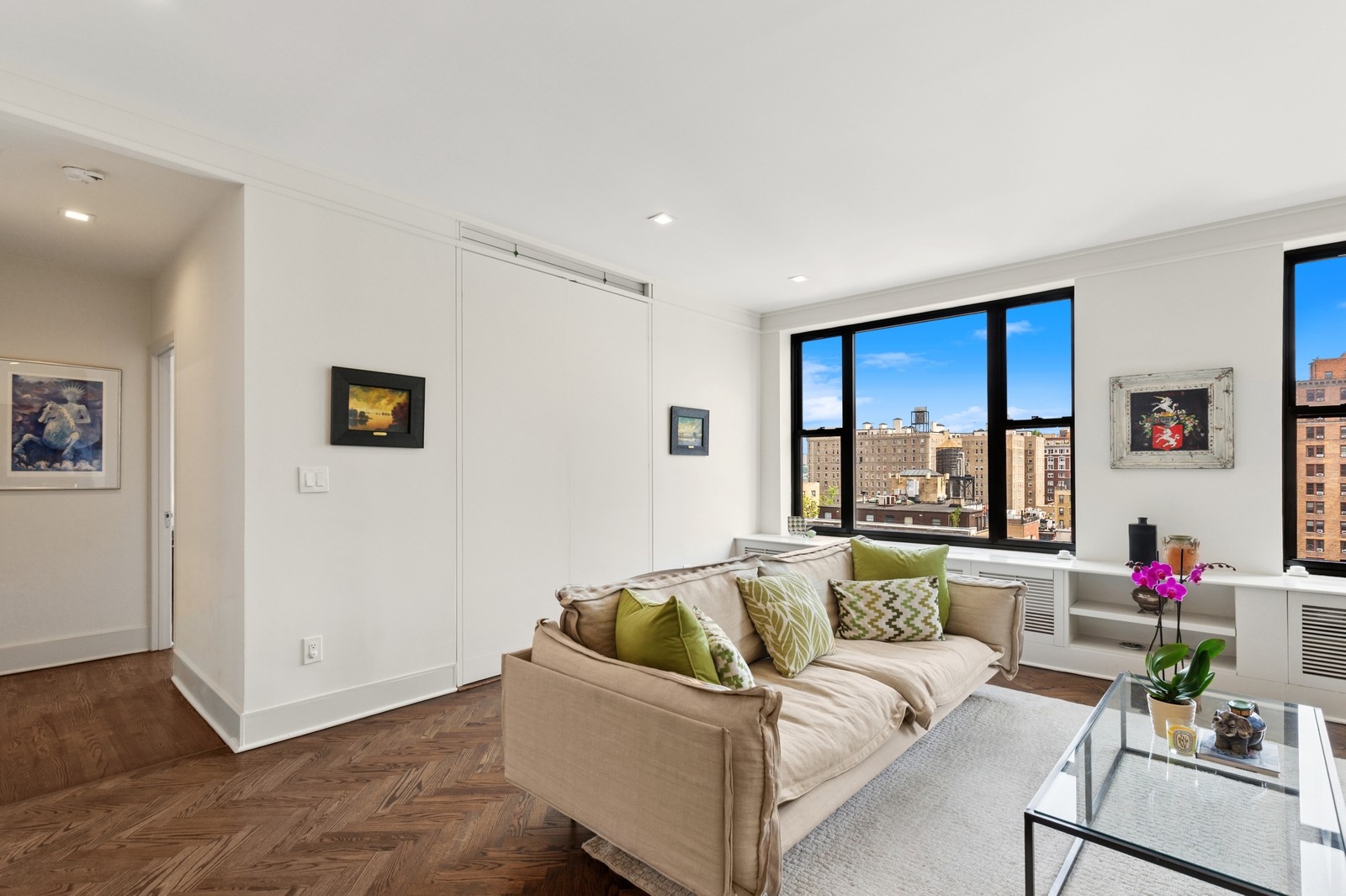 309 West 86th Street, Unit 11B Manhattan, NY 10024 - Photo 5 of 13 a living room with furniture and wooden floor