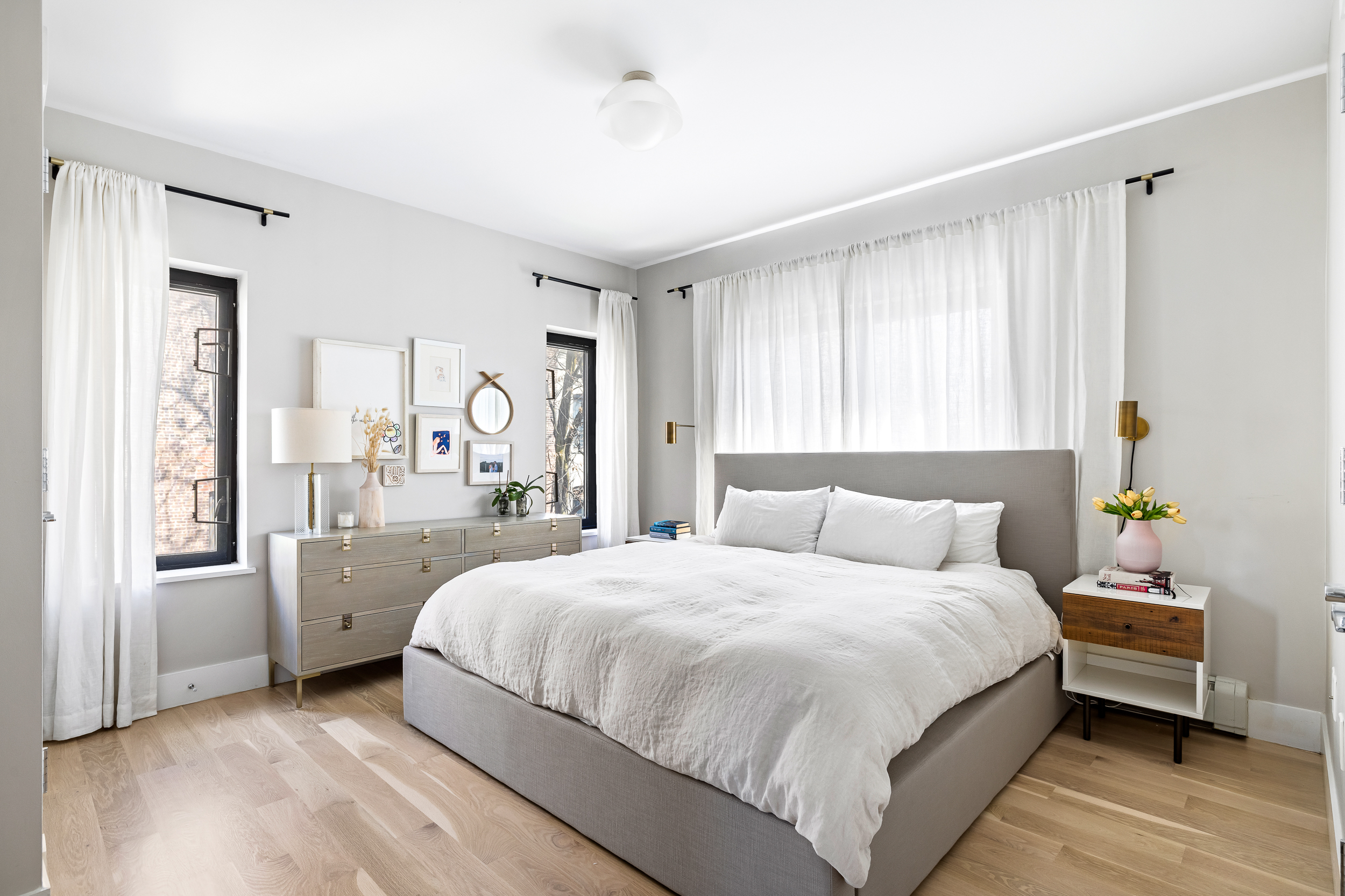 47 Dean Street, Unit 3B Brooklyn, NY 11201 - Photo 6 of 11 a bedroom with a large bed and a window