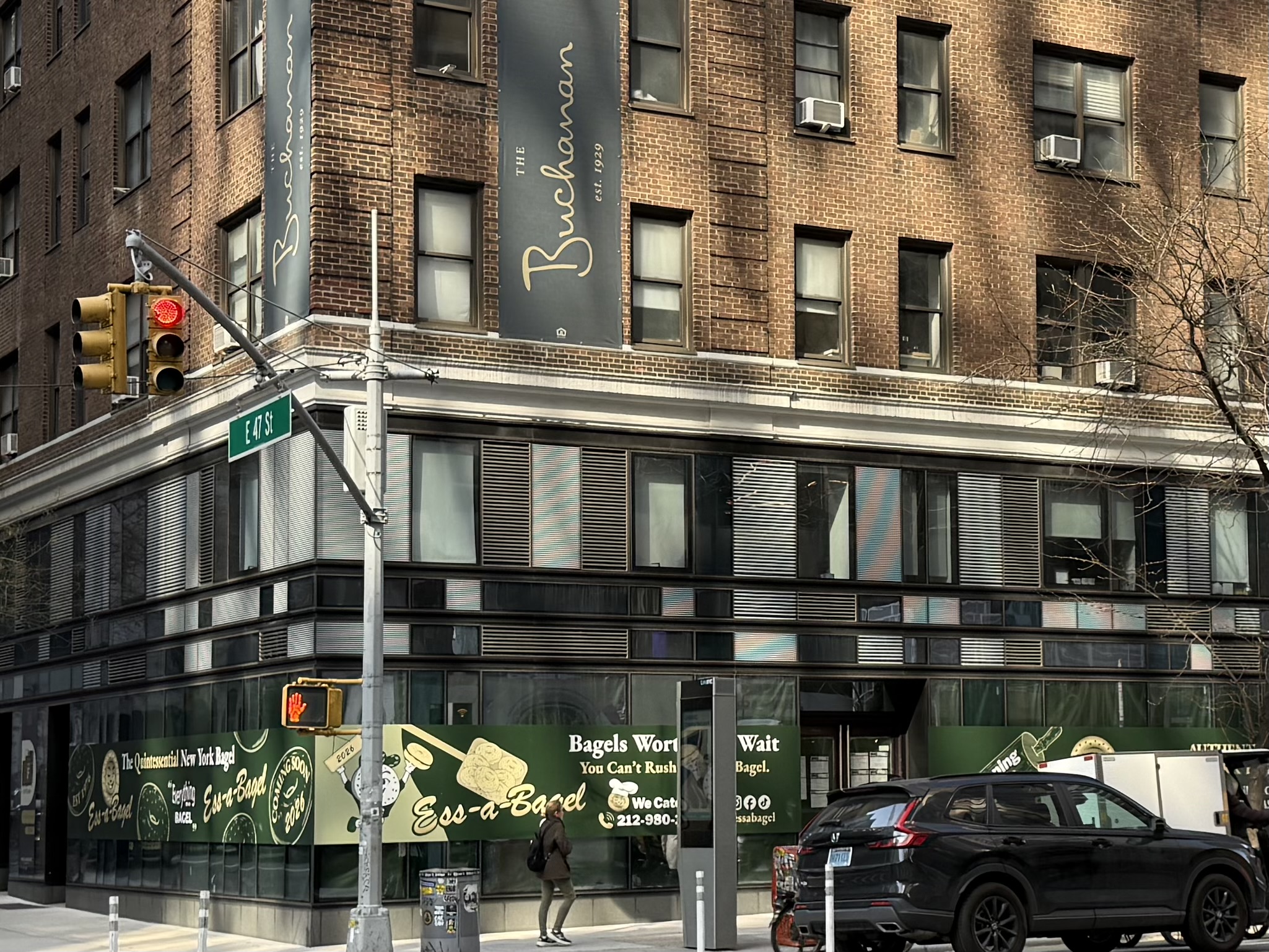 236 East 47th Street, Unit 27DE Manhattan, NY 10017 - Photo 16 of 16 a front view of a building with street