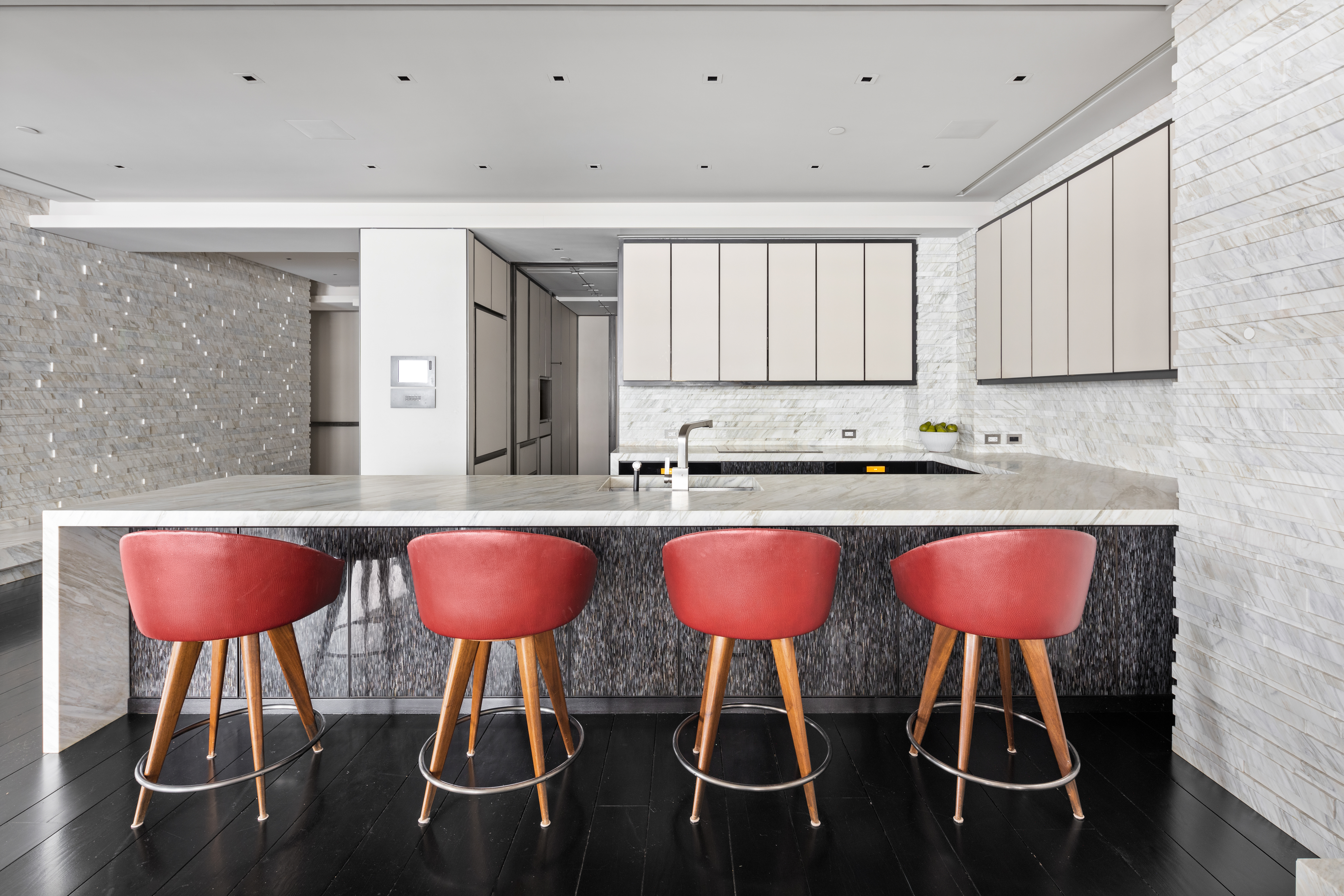 219 East 67th Street, Unit 5 Manhattan, NY 10065 - Photo 5 of 18 a kitchen with a table chairs and window