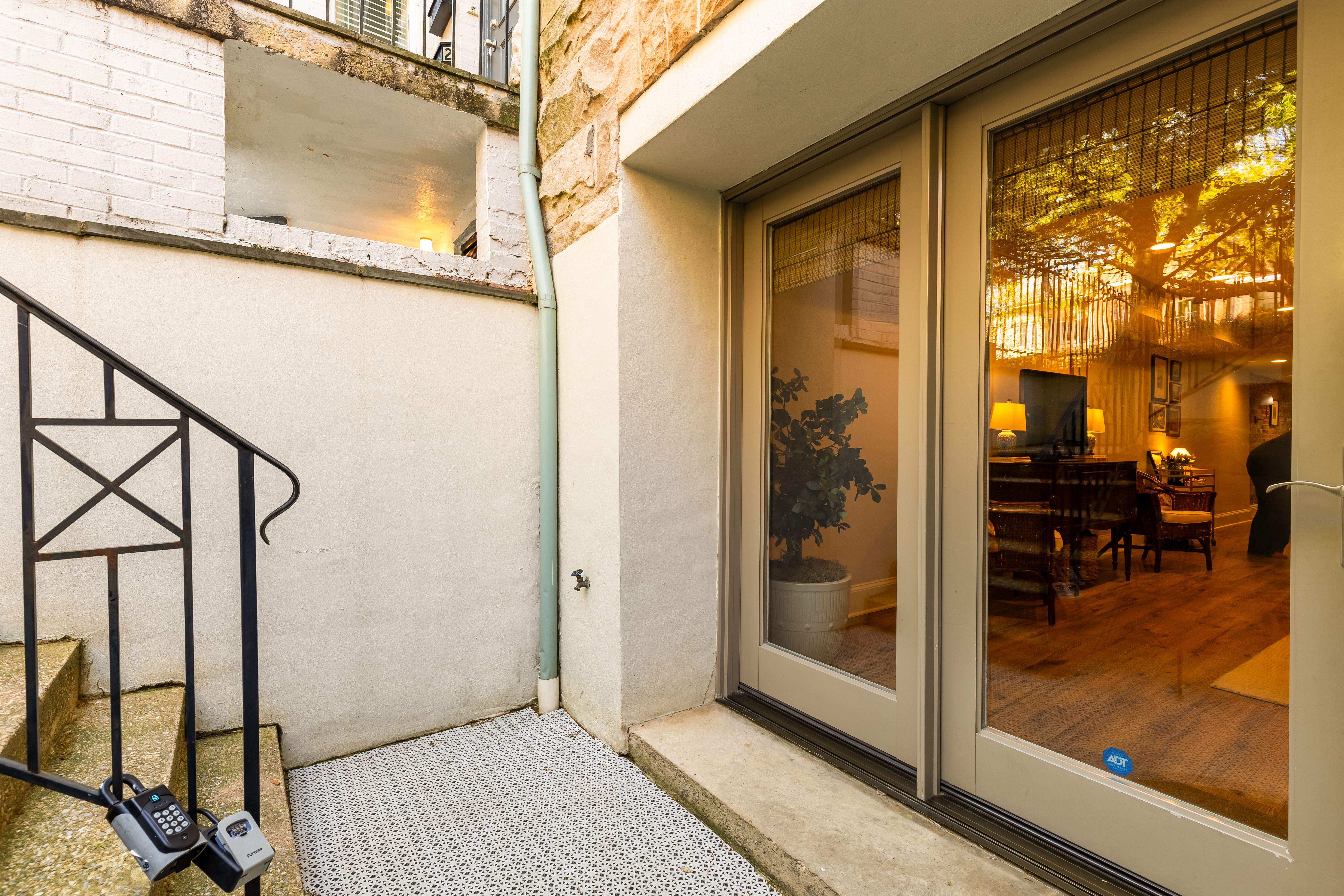 1354 Kenyon Street Northwest, Unit G Washington, DC 20010 - Photo 4 of 35 a view of a room with wooden floor and windows