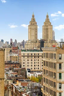 a view of a city that has tall building