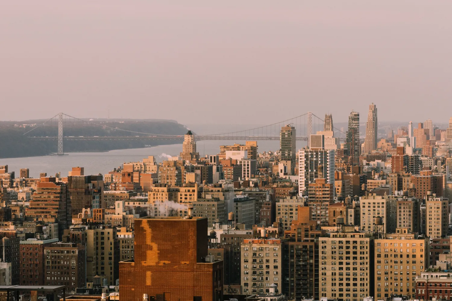 a view of a city with tall buildings
