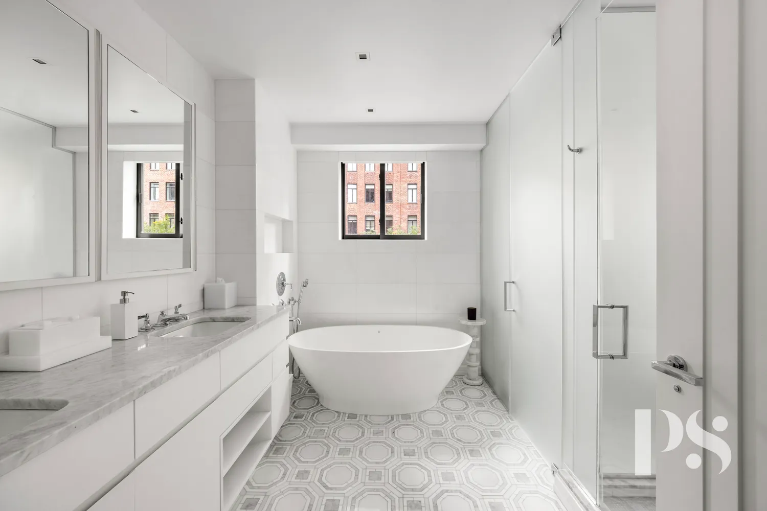 a spacious bathroom with a bathtub sink and toilet