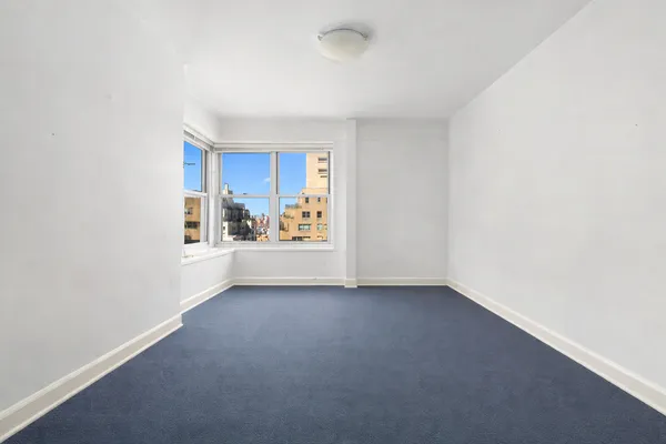 a view of a balcony with city view
