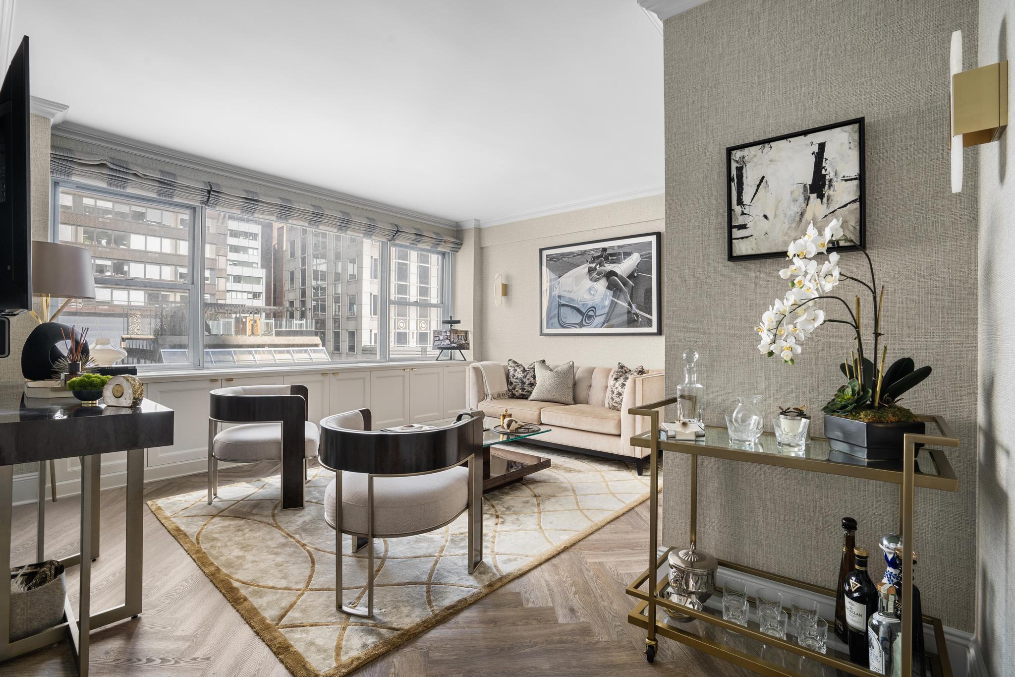 110 East 57th Street, Unit 10CD Manhattan, NY 10022 - Photo 7 of 16 a living room with fireplace furniture and windows