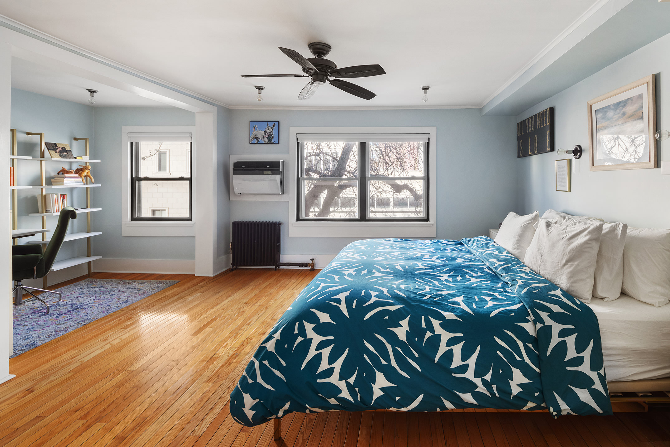 214 Withers Street Brooklyn, NY 11211 - Photo 5 of 10 a bedroom with a bed window and a table