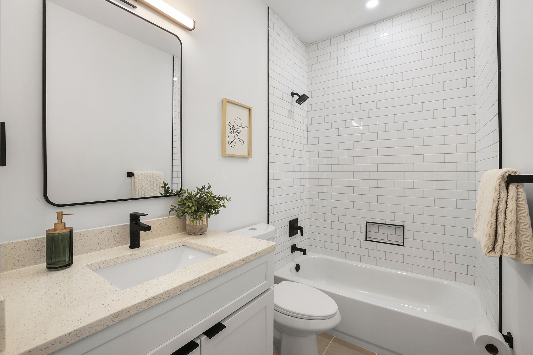 1036 Howard Road Southeast Washington, DC 20020 - Photo 28 of 41 a bathroom with a sink a toilet and shower