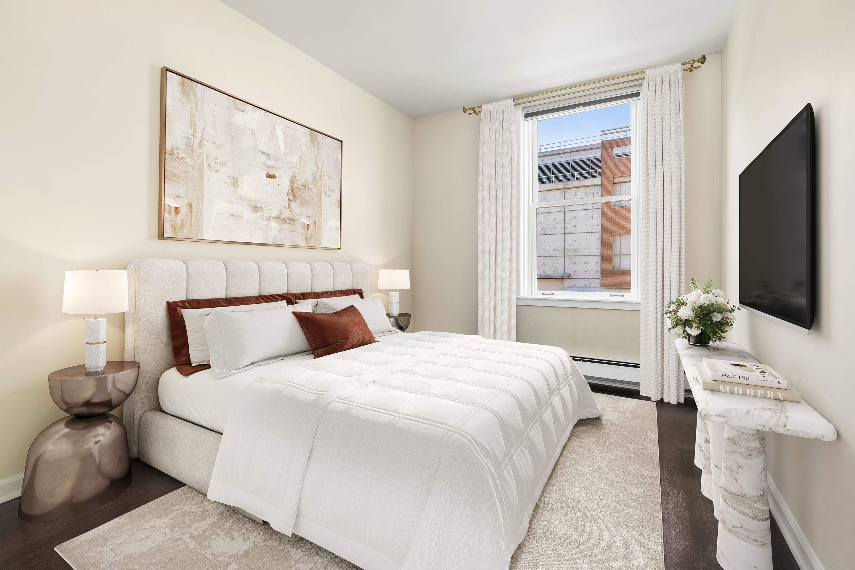 160 West 11th Street, Unit 1 Manhattan, NY 10011 - Photo 11 of 18 a bedroom with a bed and a flat screen tv