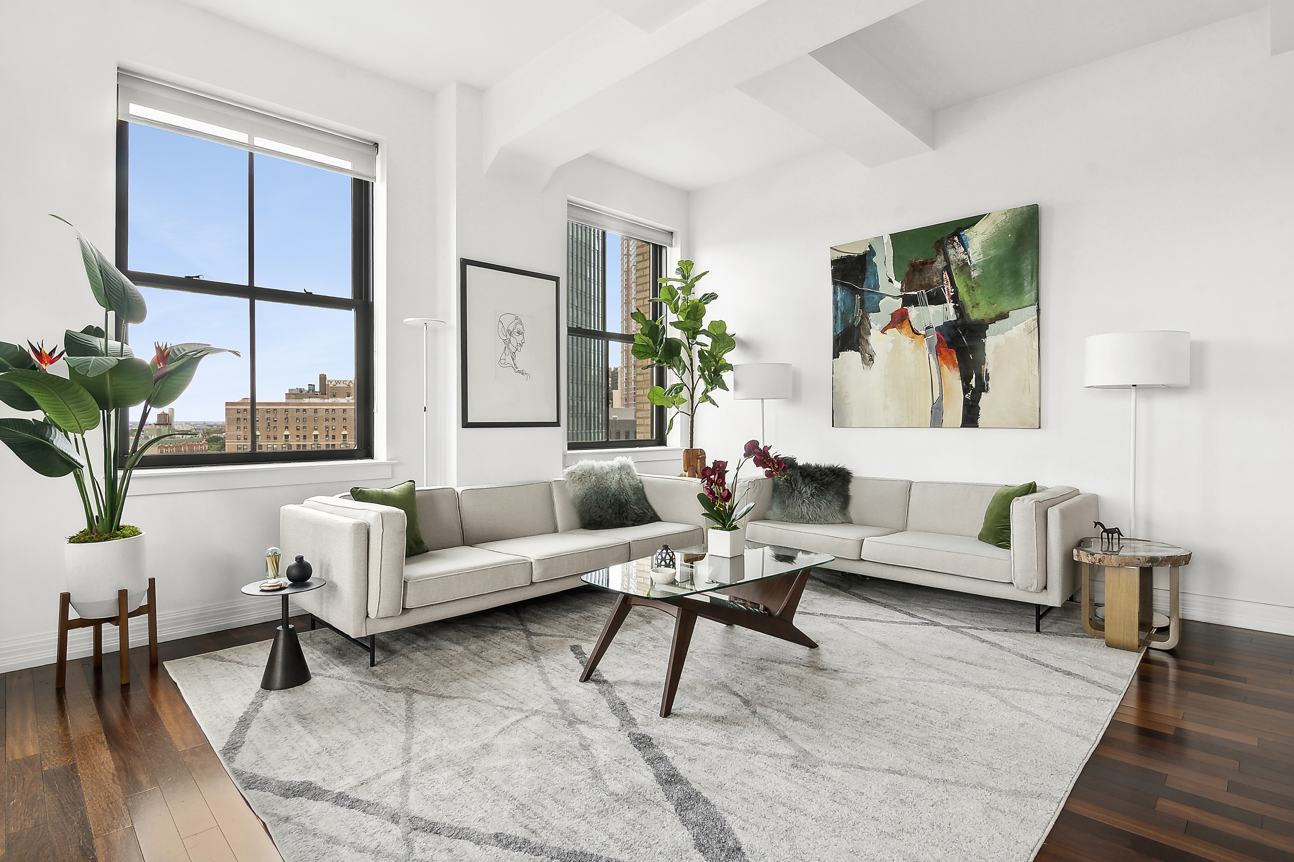 1 Hanson Place, Unit 10H Brooklyn, NY 11243 - Photo 2 of 13 a living room with furniture and a large window
