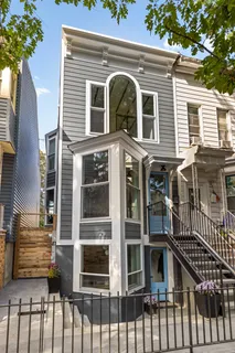 a front view of a house with a porch