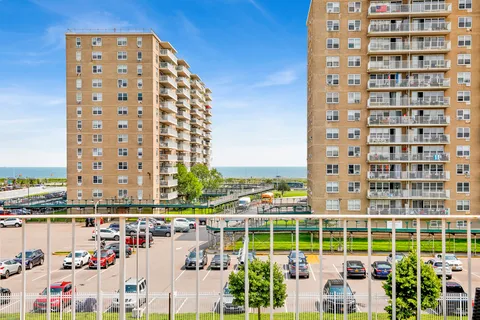 a view of a city with tall buildings