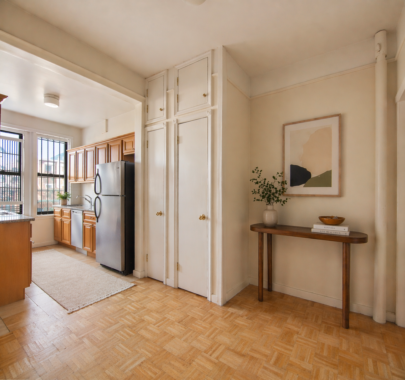 794 Manhattan Avenue, Unit 2R Brooklyn, NY 11222 - Photo 5 of 6 a view of a kitchen with stainless steel appliances granite countertop a refrigerator and a stove top oven