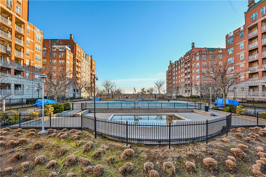 135 Oceana Drive East, Unit 2C Brooklyn, NY 11235 - Photo 25 of 29 a view of a swimming pool with a patio
