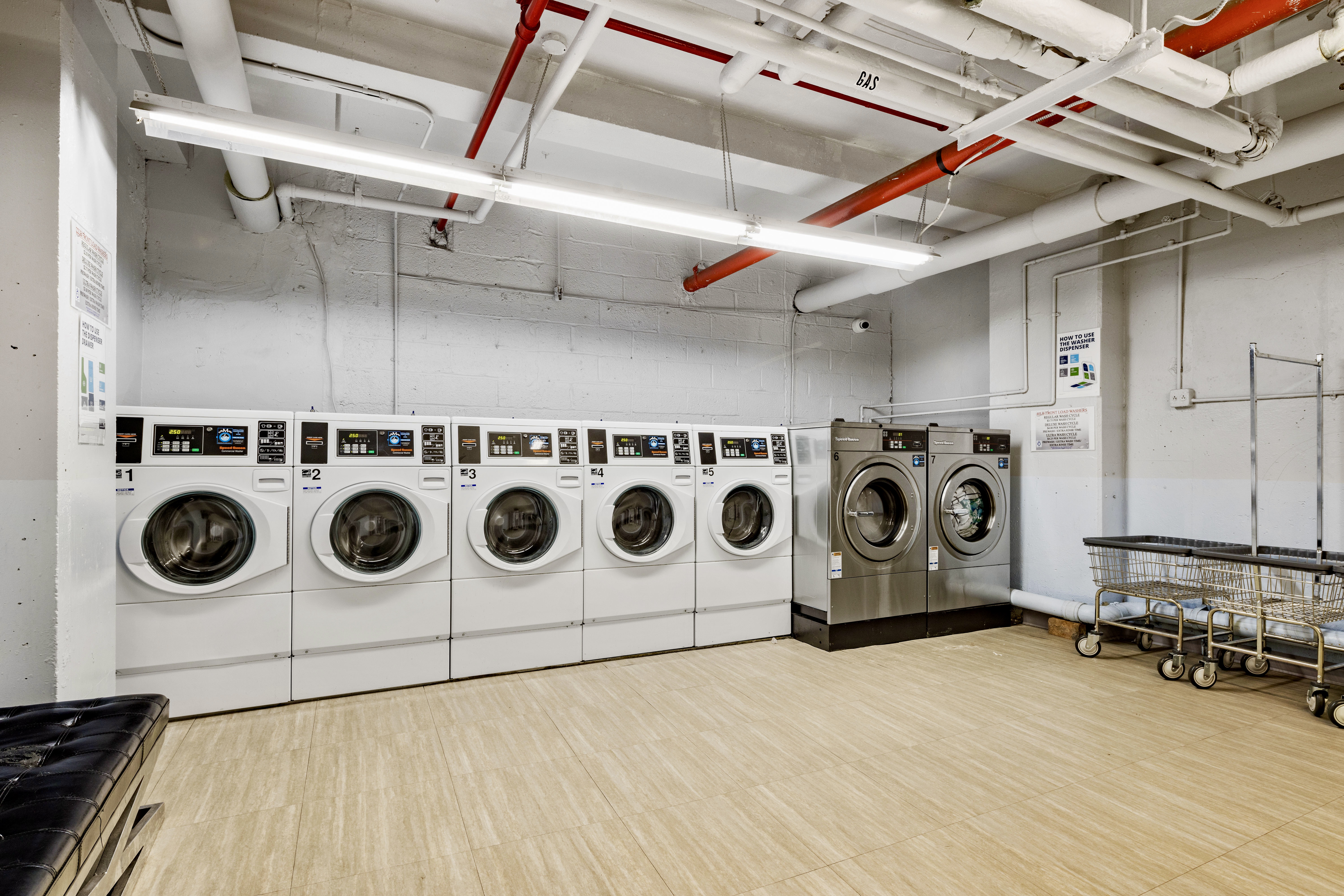 99-72 66th Road, Unit 3R Queens, NY 11374 - Photo 8 of 10 a utility room with dryer and washer