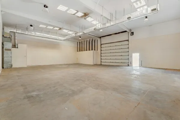 a view of a room with kitchen