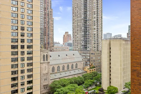 a view of a city with tall buildings