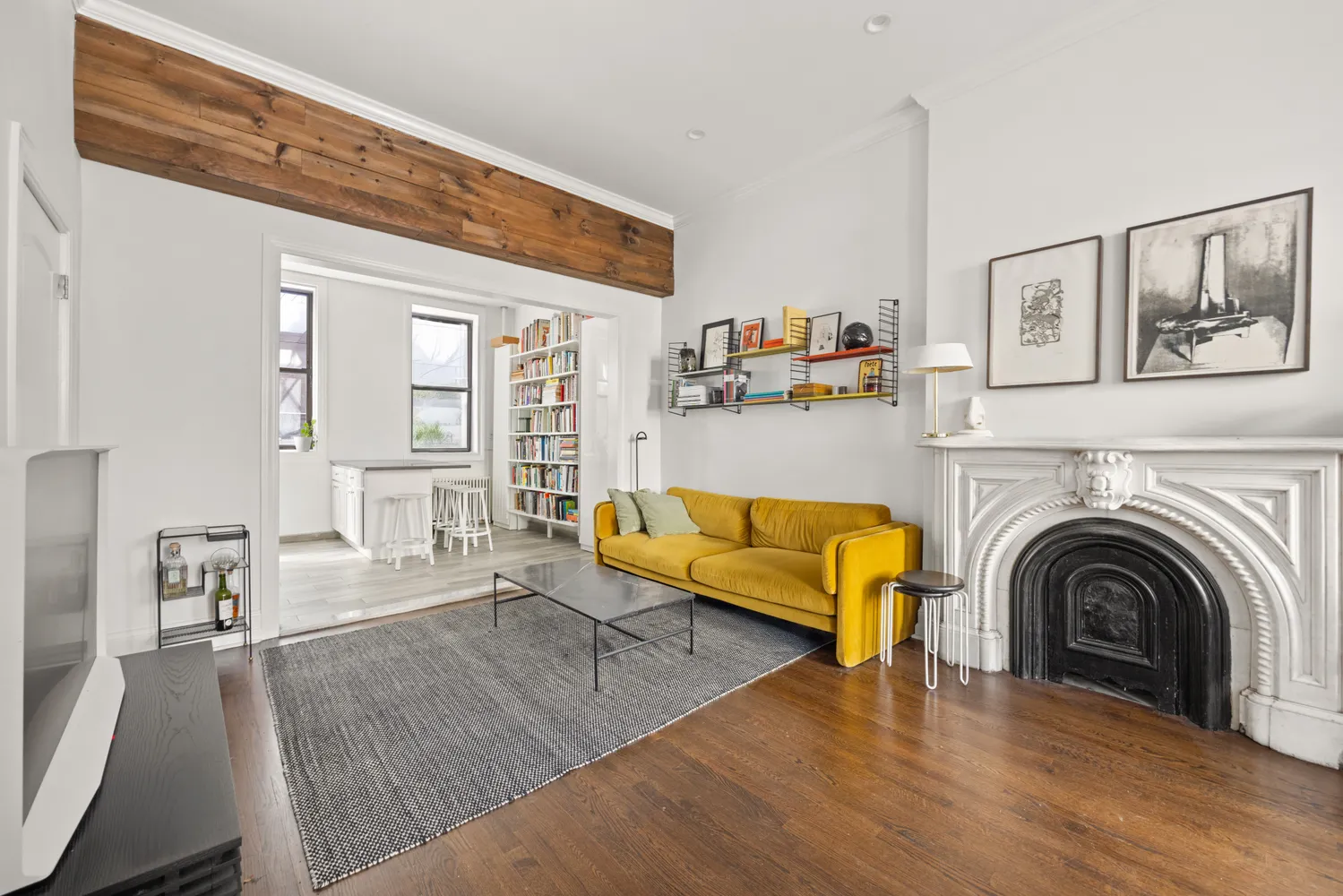 a bathroom with a toilet sink a mirror and shower