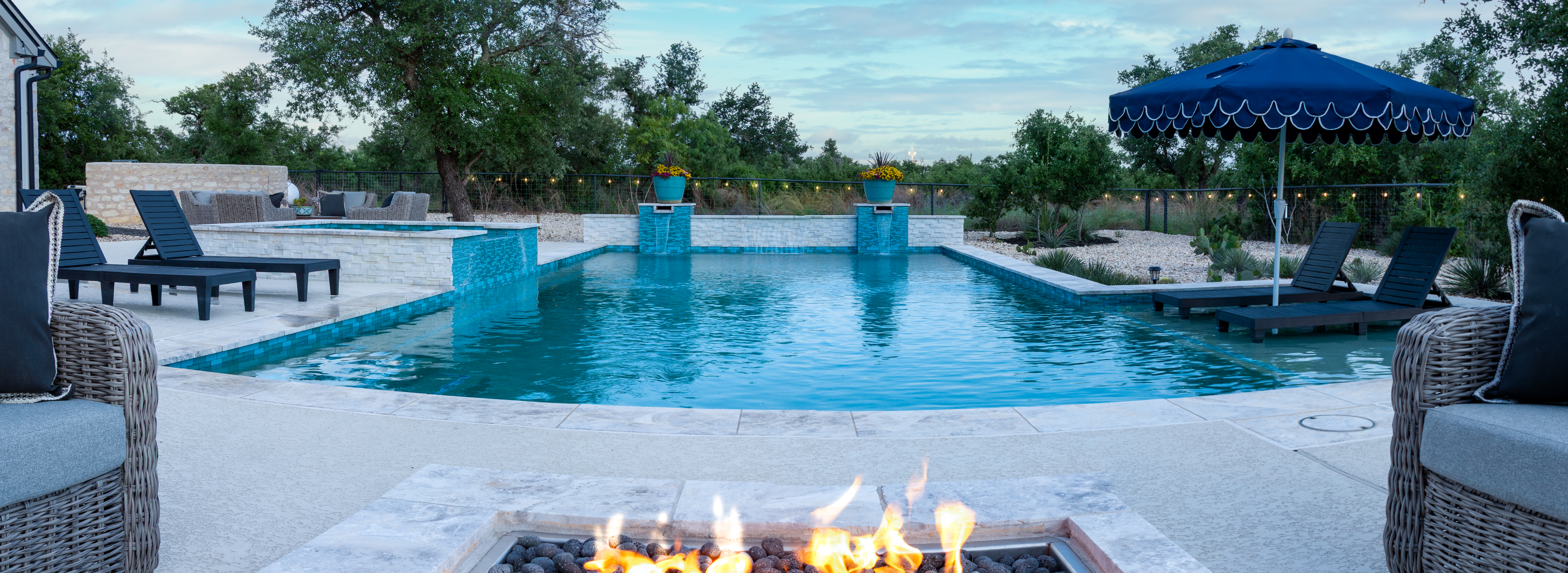 272 Slate Rock Road Willow City, TX 78675 - Photo 5 of 30 a view of a swimming pool with a patio