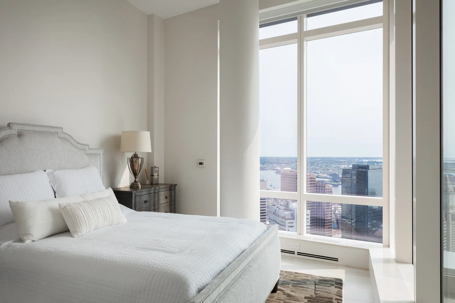 a bathroom with a shower sink and mirror