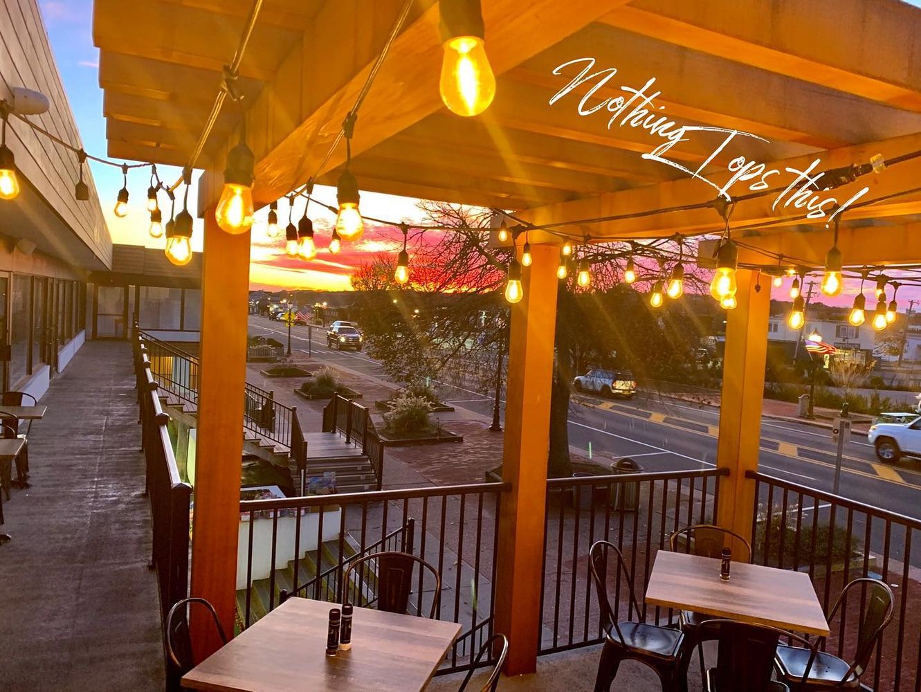 a view of a chairs and table in the balcony