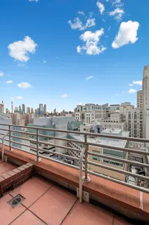 a view of a terrace with city view