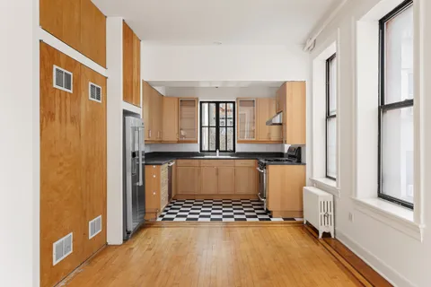 a view of a living room and dining room