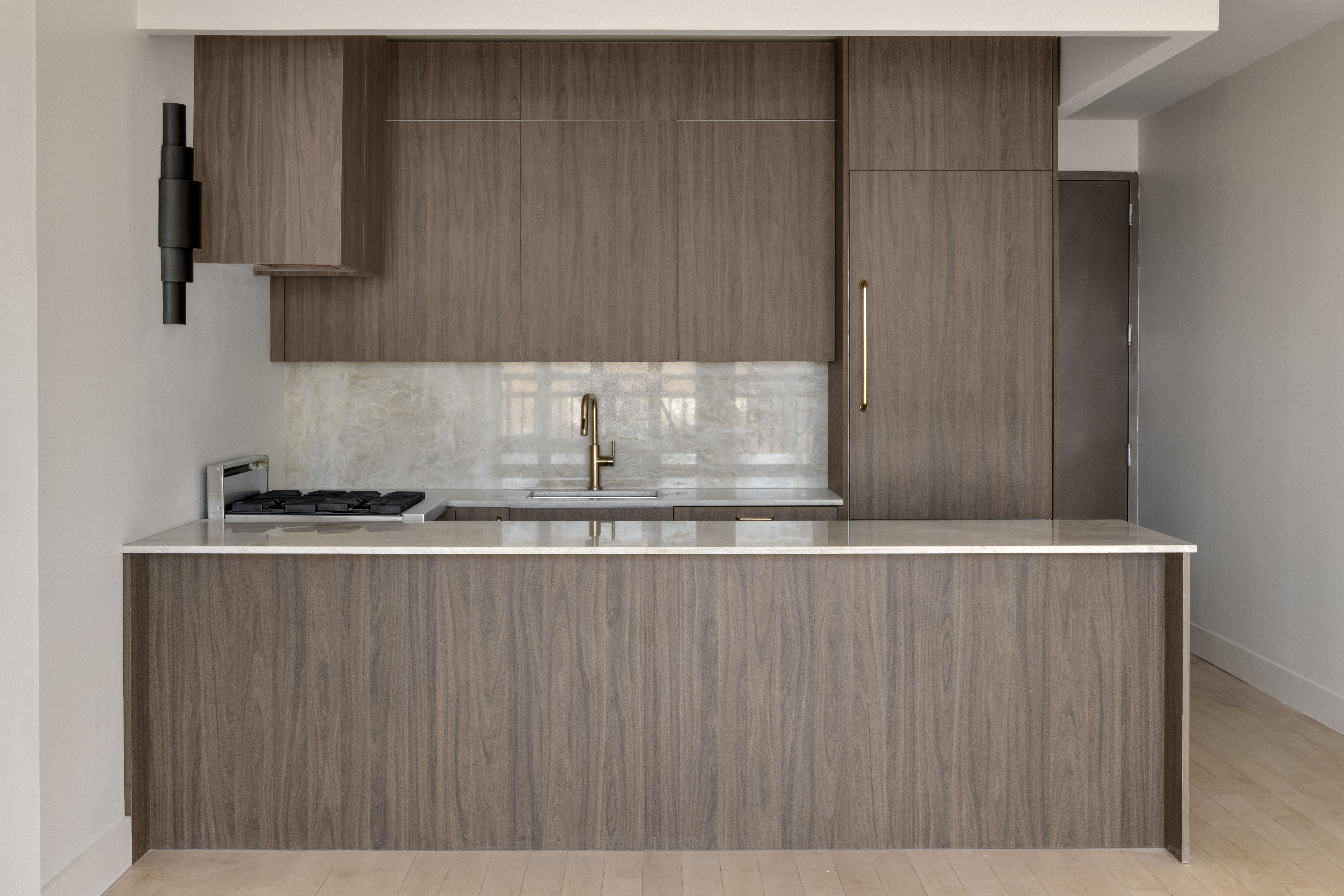 189 Bridge Street, Unit 9B Brooklyn, NY 11201 - Photo 3 of 11 a kitchen with a sink and cabinets