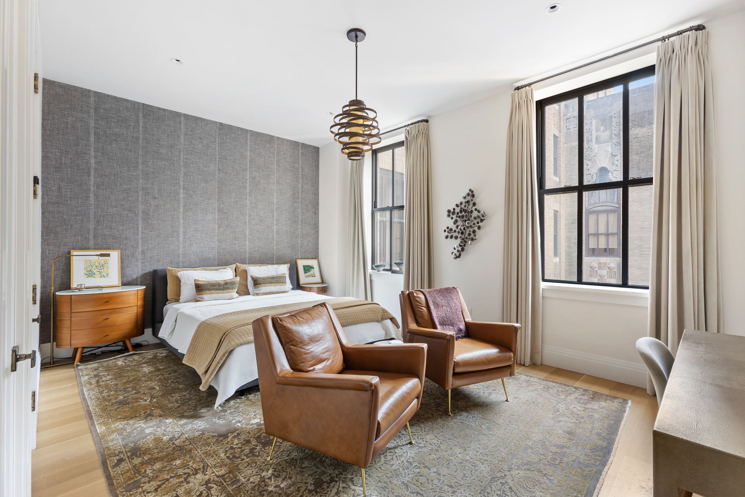 100 Barclay Street, Unit 17A Manhattan, NY 10007 - Photo 7 of 24 a bedroom with furniture and a window