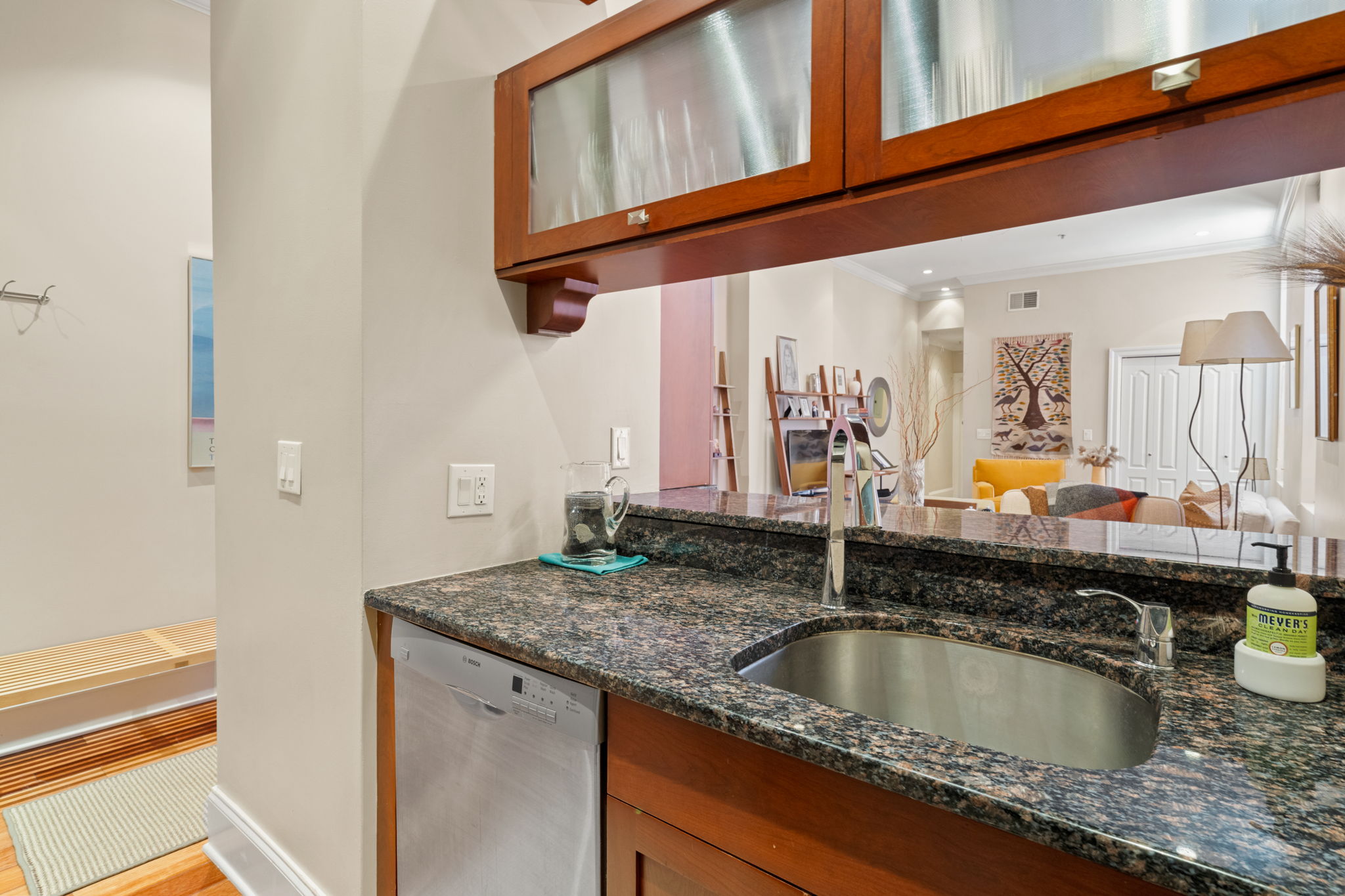 2049 Walnut Street, Unit 1R Philadelphia, PA 19103 - Photo 5 of 18 a bathroom with a granite countertop sink and a mirror