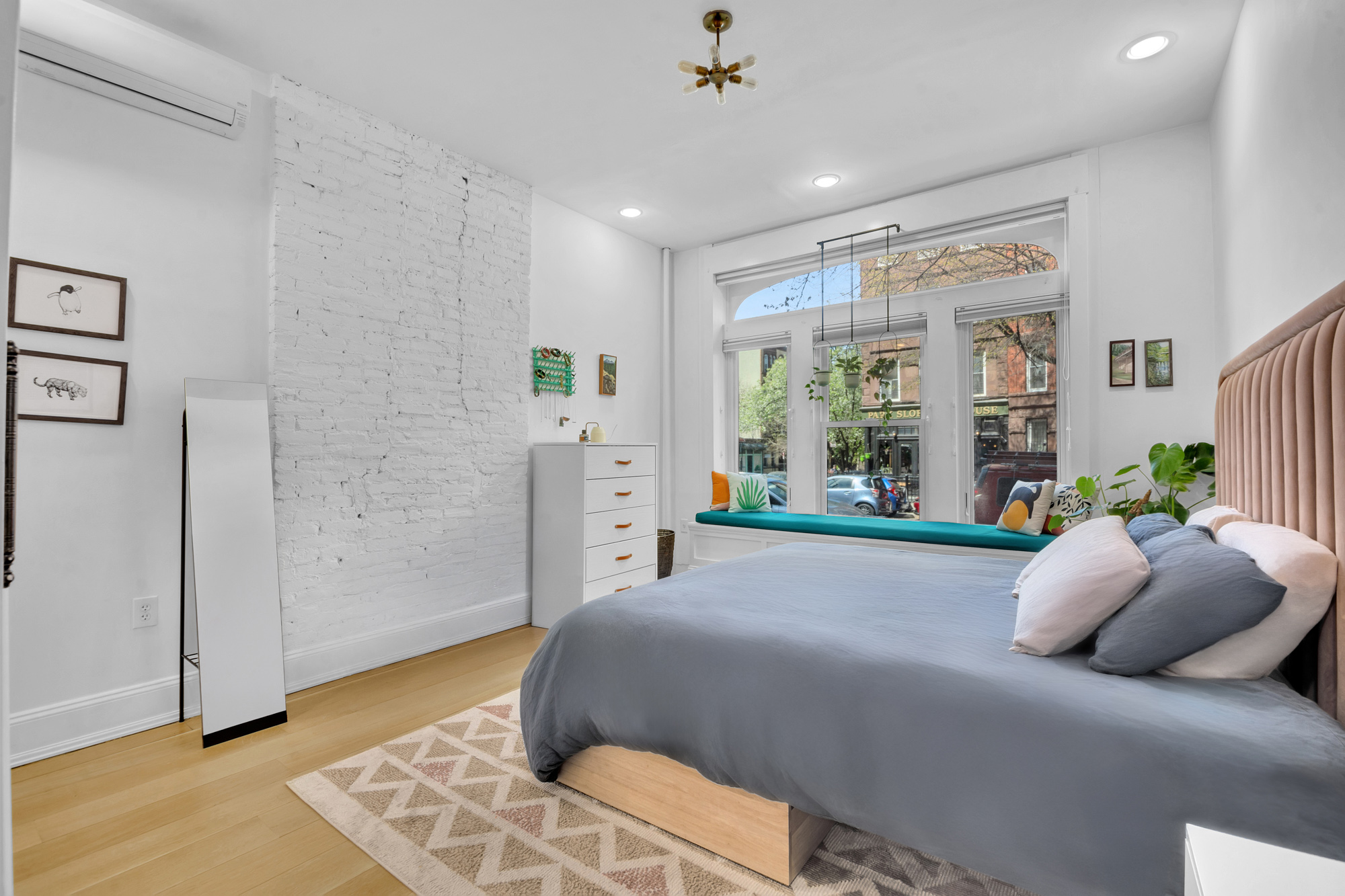 361 6th Avenue, Unit 1 Brooklyn, NY 11215 - Photo 5 of 11 a living room with furniture and a large window