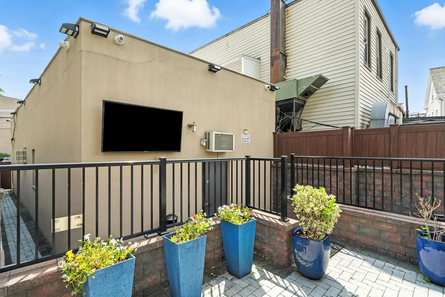 a front view of a house with patio