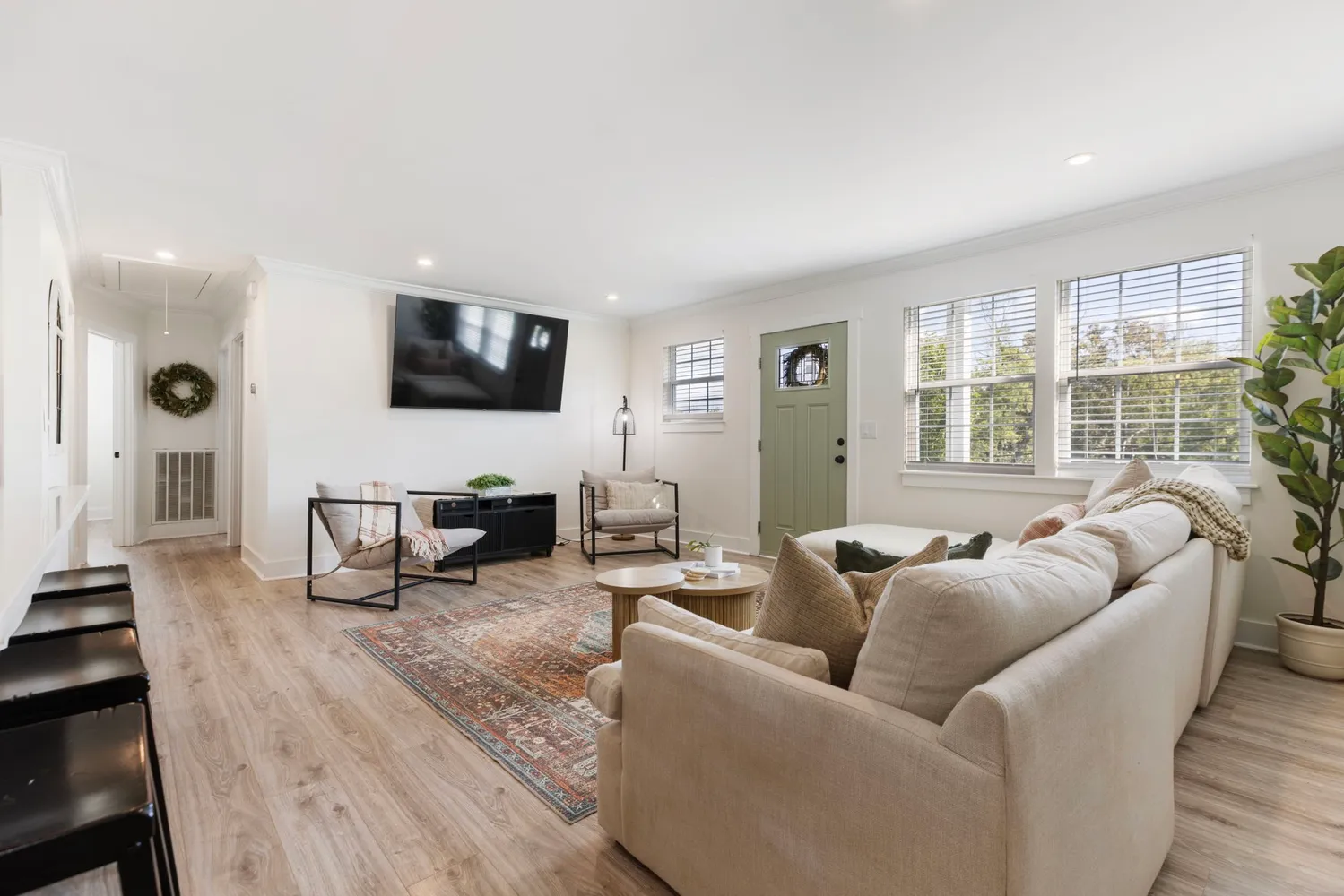 a kitchen with stainless steel appliances a stove and a microwave
