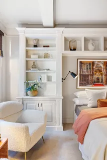 a living room with furniture and baby window