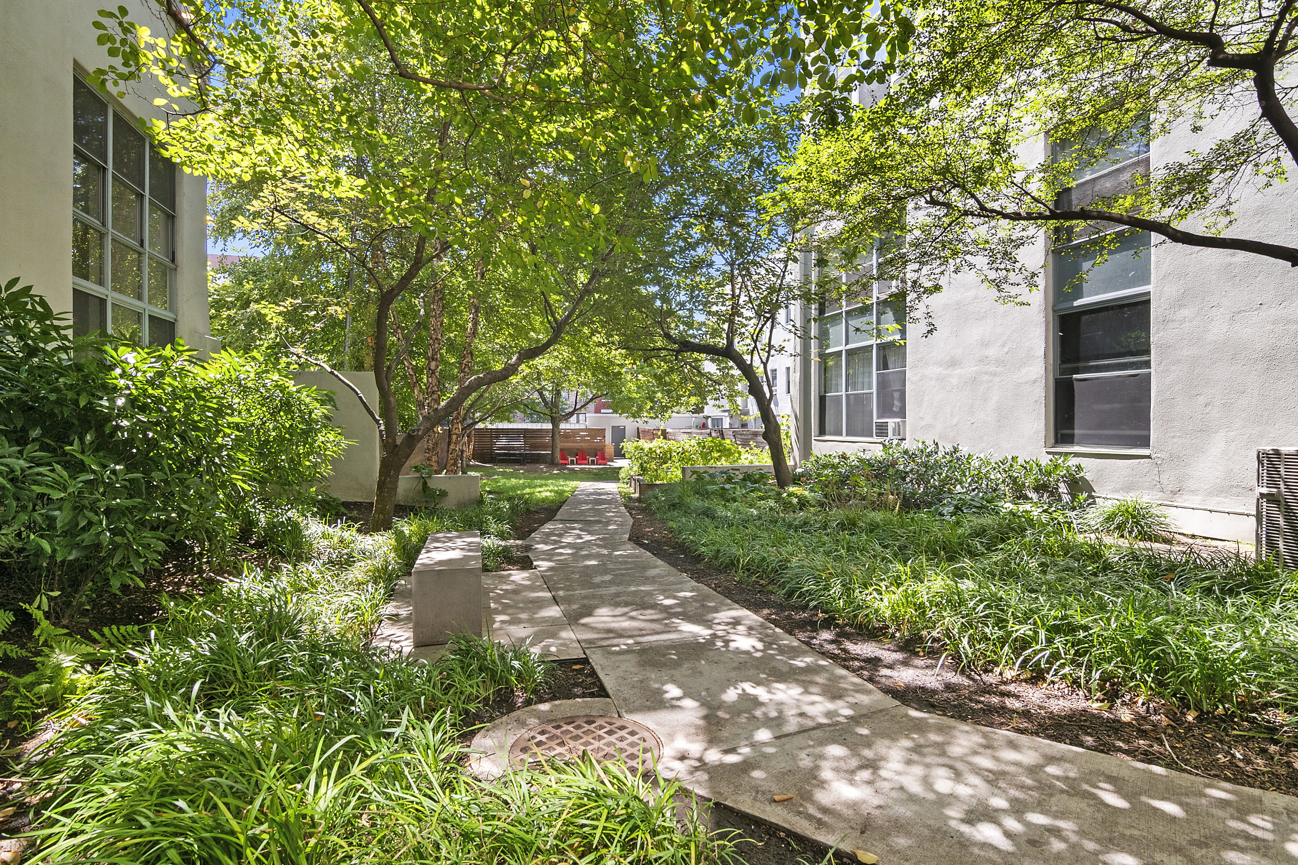 204 Huntington Street, Unit 1D Brooklyn, NY 11231 - Photo 9 of 12 a front view of a house with a yard