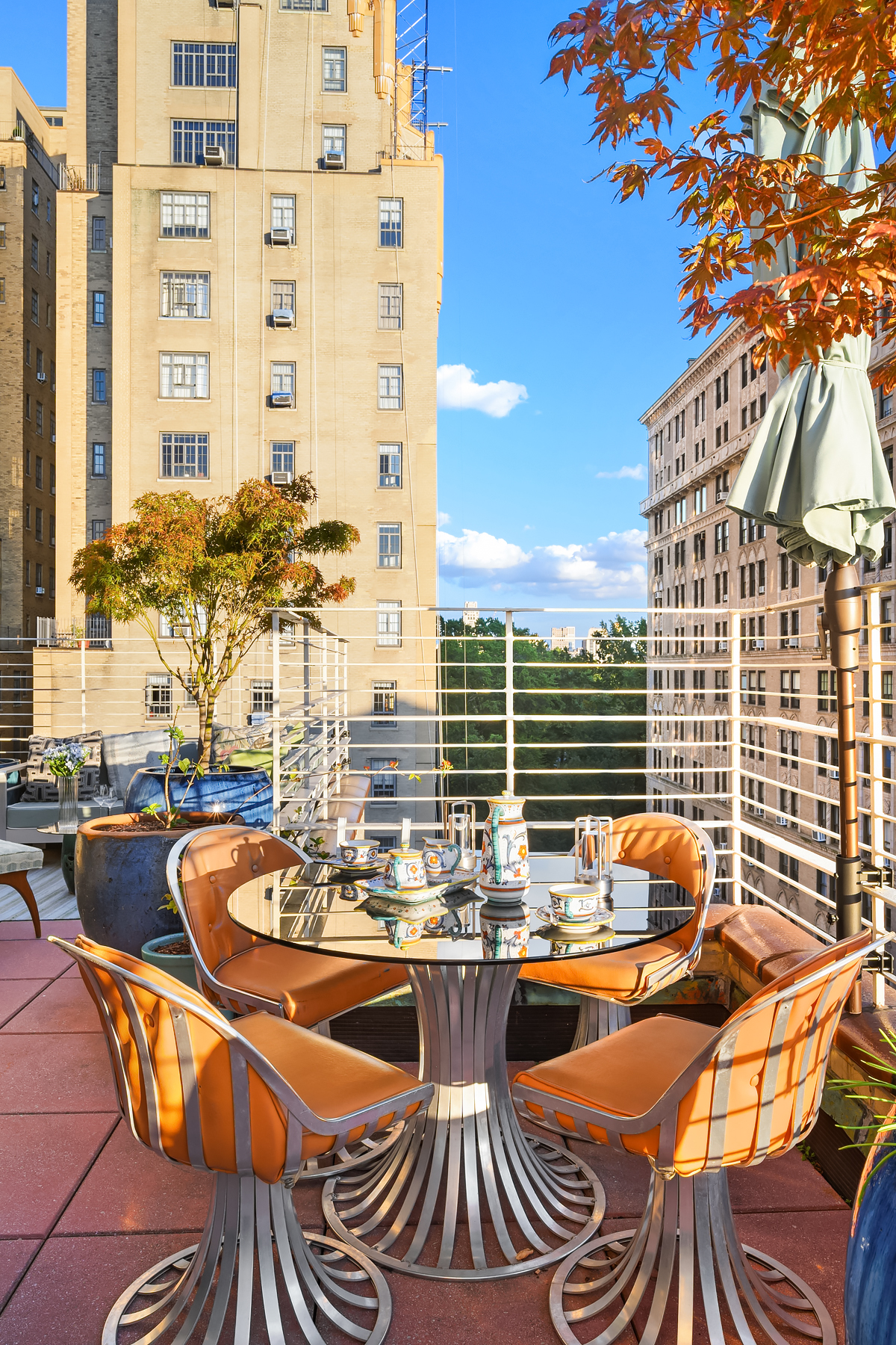15 West 84th Street, Unit PHB Manhattan, NY 10024 - Photo 4 of 15 a view of a balcony with couch and chairs