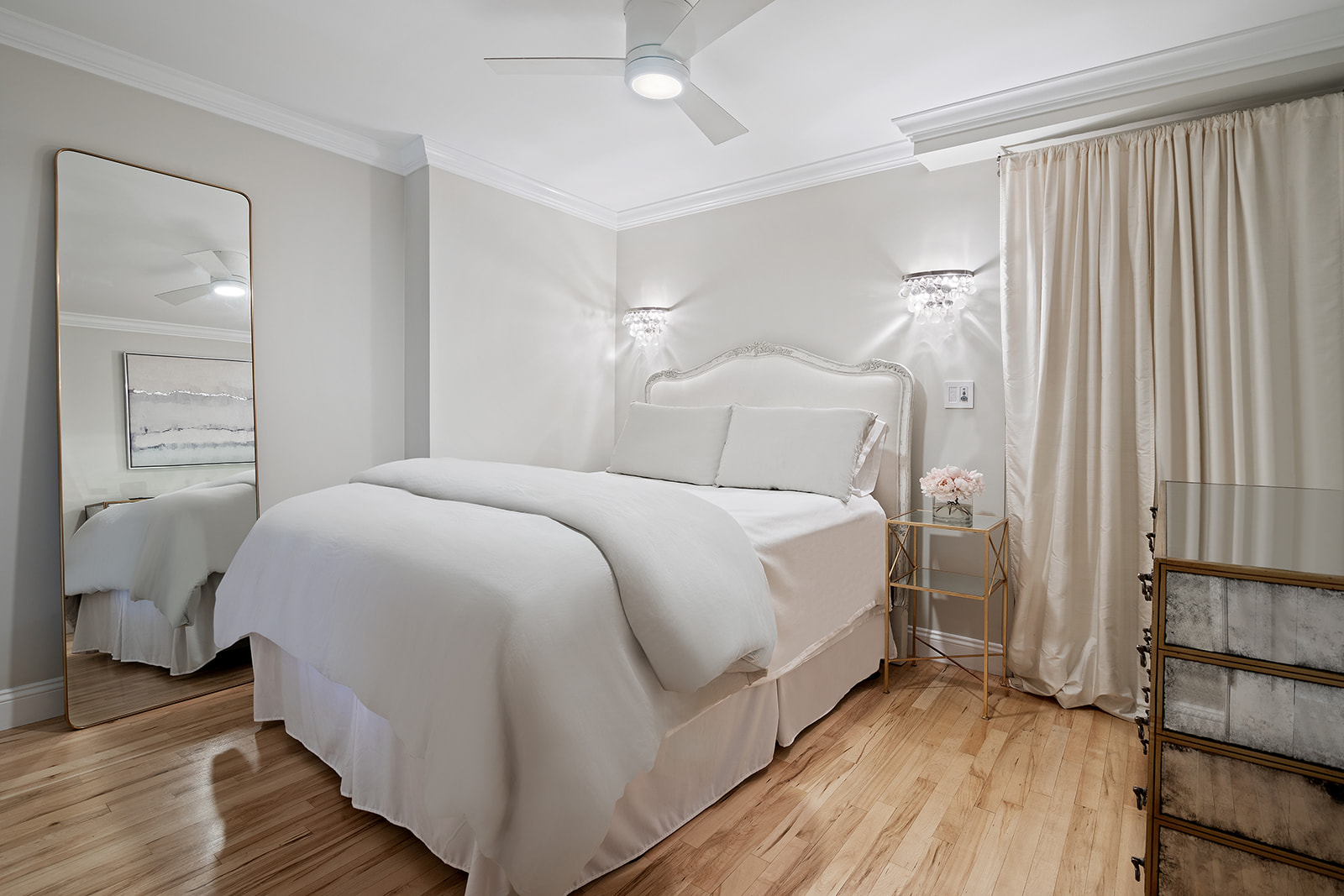 57 East 75th Street, Unit 2F Manhattan, NY 10021 - Photo 7 of 10 a bedroom with a bed and wooden floor