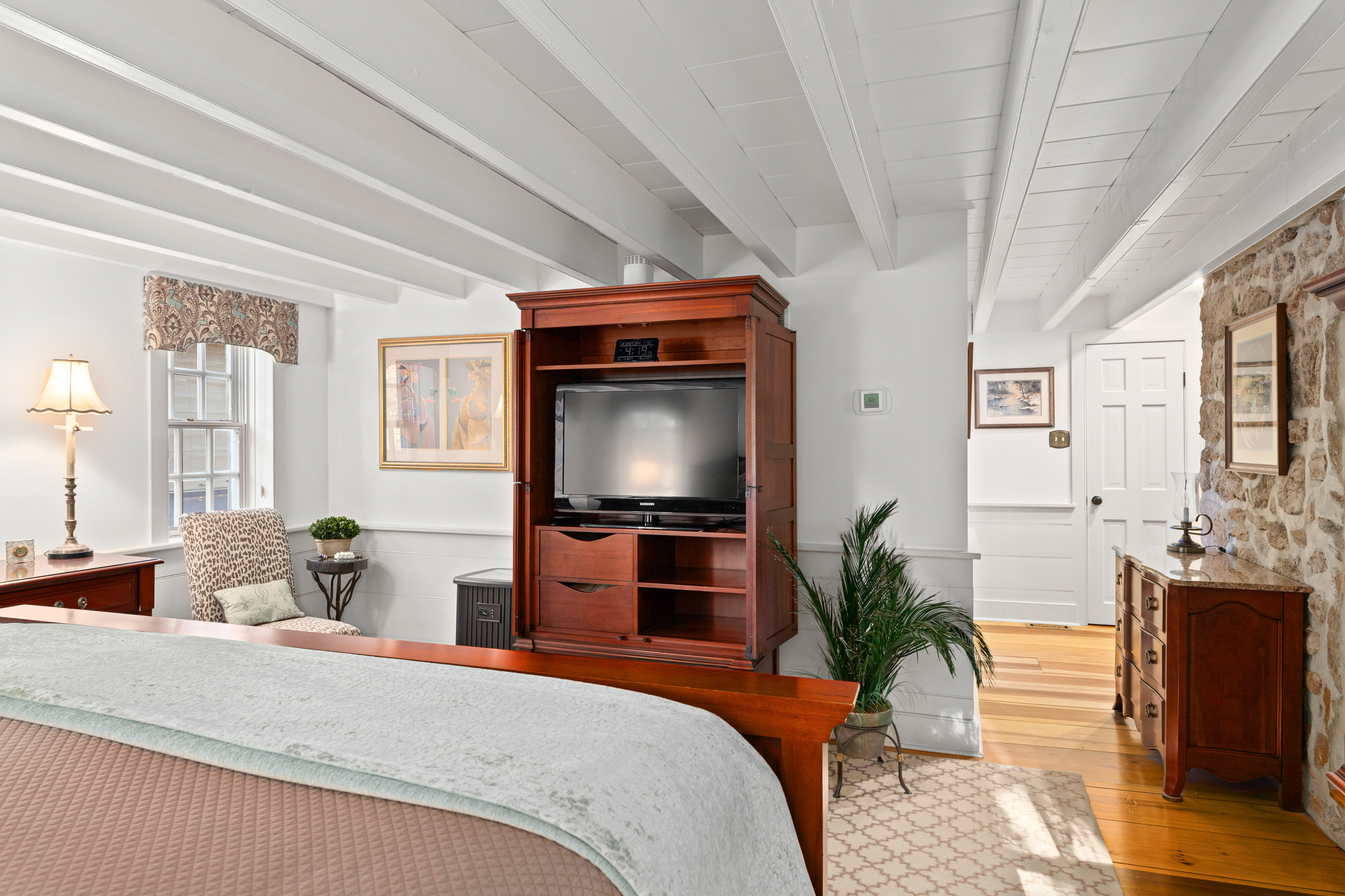 791 Grubbs Mill Road Berwyn, PA 19312 - Photo 30 of 76 a bedroom with furniture and flat screen tv