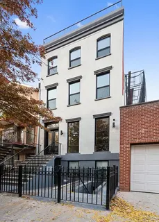 a front view of a building with glass windows