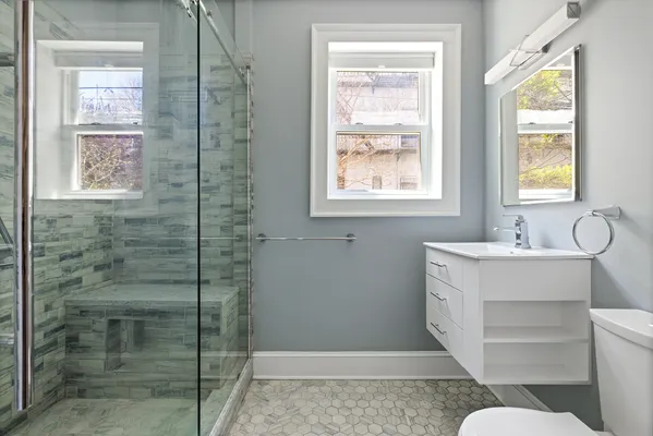 a bathroom with a sink and a shower